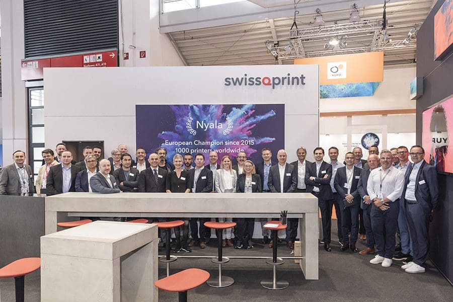 swissQprint trade fair team cropped
